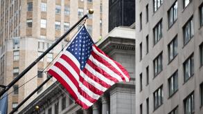 Wall street American flag in the Financial District of Lower Manhattan