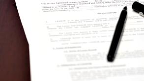 Loan document and agreement with pen for signing