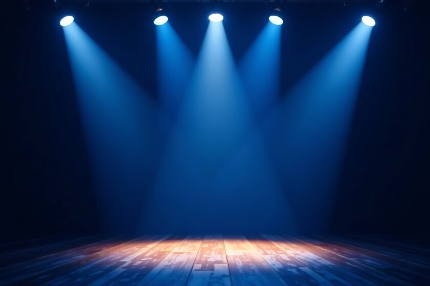 Blue spotlights shining on dark background, illuminating stage, background, spotlights, dark