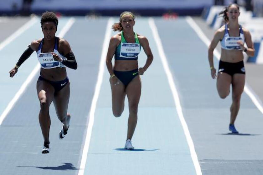 Rosangela Santos (L) of Brazil competes during the "Mano a Mano" challenge, a 100-meter race, at the Brazilian Jockey Club in Rio de Janeiro, Brazil October 1, 2017. REUTERS/Bruno Kelly