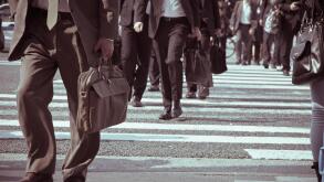 Low Section Of Business People Walking On Road