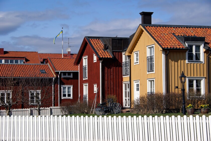 Traditional red and yellow Swedish houses in Mariefred, Sweden.