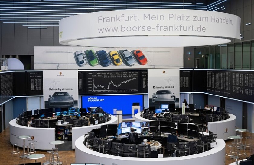 28 September 2022, Hesse, Frankfurt/Main: Already decorated for the Porsche IPO, the trading hall of Deutsche Borse in Frankfurt is ready on the eve of the sports car manufacturer's initial listing planned for Thursday (Sept. 29, 2022). Photo: Boris Roess