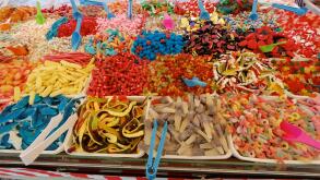colorful selection of sweets or candy colourful market stall choice of children pick and mix foreign  sweetmeats pik n mix Glasgow Christmas market