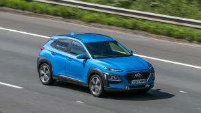 2019 Hyundai Kona Premium Blue Car Hatchback Petrol driving on the M6 motorway near Preston in Lancashire, UK