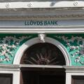 Detail of the decorative exterior of the Lloyds Bank branch on the high street in Guildford, Surrey, UK