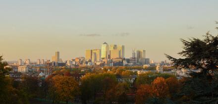 Sunset view of the City of London, Canary Wharf, taken from Greenwich Park