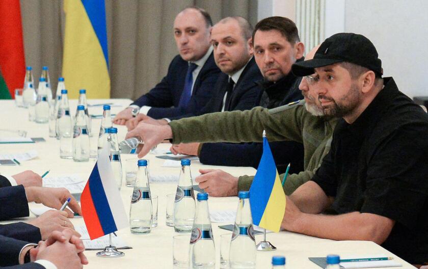 GOMEL REGION, BELARUS - FEBRUARY 28, 2022: Ukrainian Parliament member Davyd Arakhamia, Ukraine's Defence Minister Oleksiy Reznikov, Ukraine's Deputy Prime Minister Mykola Tochytskyi (from R) attend Russian-Ukrainian talks. Credit: ITAR-TASS News Agency/A