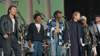 Rock stars, from left, Bruce Springsteen, Tracy Chapman, Youssou N'dour and Sting are seen at Wembley Stadium, London, Sept. 1, 1988, as they opened a global rock tour for human rights by Amnesty International. (AP Photo/John Redman)