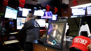 New York, United States. 03rd Apr, 2025. Trump Maga merchandise is present on the floor of the New York Stock Exchange as traders work on Wall Street on Thursday, April 3, 2025 in New York City. The Dow Jones Industrial Average opened today down over 1000