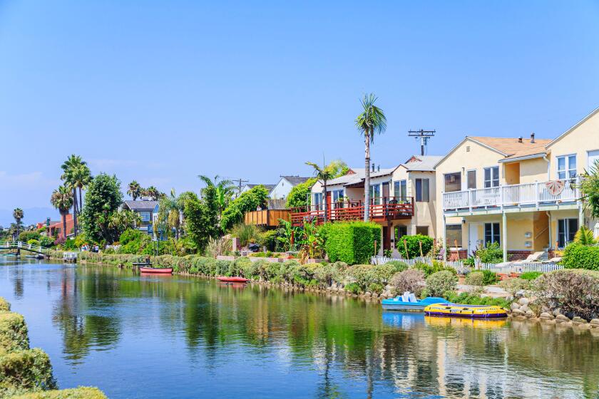 Upscale canal-side residential real estate property along the pretty canals in Venice, Los Angeles, California, west coast USA