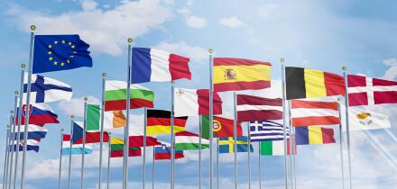The flag of the European Union with the flags of the European Union waving in the sky ,Close-up