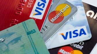 Arranged photos of various U.S. credit cards from Visa, MasterCard and American Express