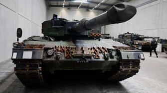 A view of a Leopard 2 tank at a production line as German Chancellor Olaf Scholz and Defence Minister Boris Pistorius visit the future site of an arms factory where weapons maker Rheinmetall plans to produce artilleries from 2025, in Unterluess, Germany,