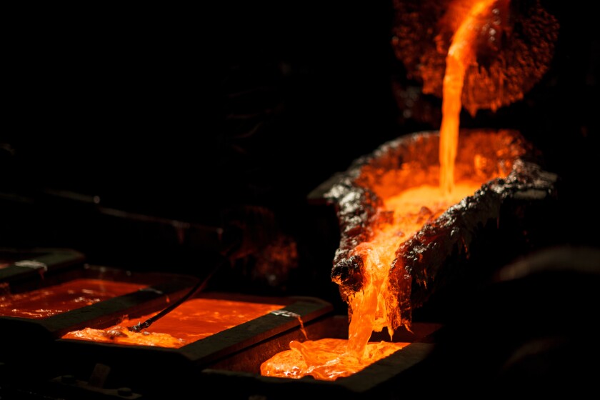Molten metal at aluminium foundry. Master alloys