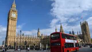 Red double-decker bus in front of the British Parliament, London, England, United Kingdom, Europe