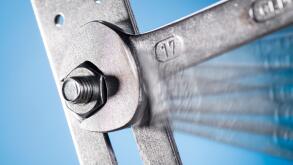 Close-up of a wrench, tighten the nut.