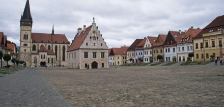 Bardejov, Slovakia - Sep 07, 2025: Walking in Bardejov medieval town center. The town is a UNESCO's World Heritage site. Streets, buildings. Cloudy su