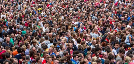 Crowd, many people in confined space, at a festival,