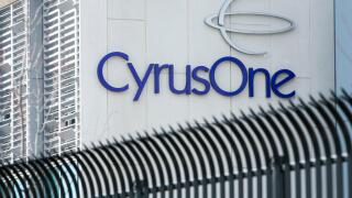 A logo sign outside of a CyrusOne Data Center in Sterling, Virginia on December 31, 2016.