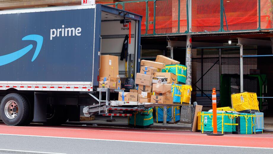 Home, residential packages on the back of an Amazon truck to be delivered in New York City.
