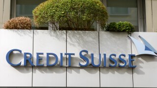 Credit Suisse sign over the entrance of the office