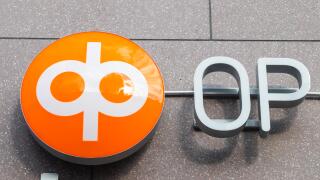 Kouvola, Finland - 22 September, 2019: OP-Pohjola Group bank sign on the wall of bank office.