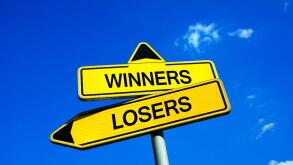Winners or Losers - Traffic sign with two options - Competitive motivation to be successful and not lose game, match, play, duel and competition