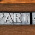 part four phrase made from metallic letterpress type on wooden tray
