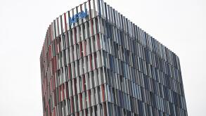 22 March 2024, Hesse, Frankfurt/Main: The logo of KfW Bankengruppe stands on the Westarkade. The state-owned promotional bank has presented its balance sheet for the past financial year 2023. Photo: Arne Dedert/dpa