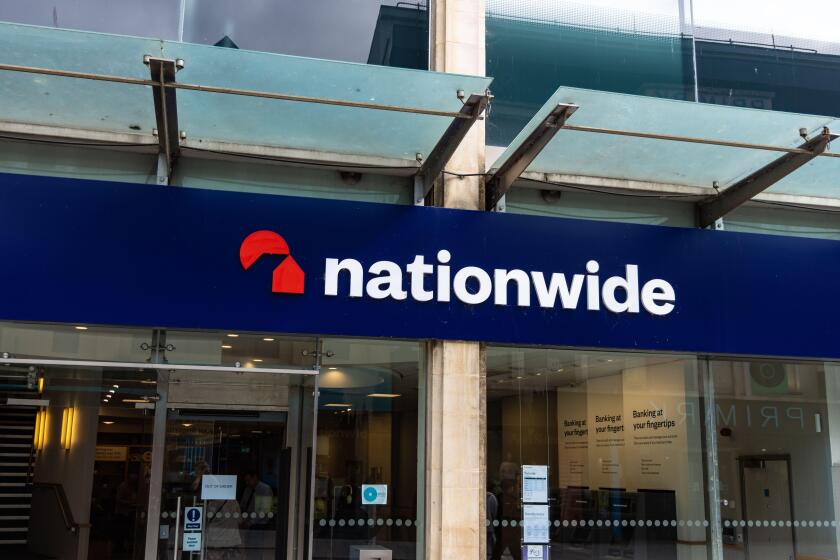 CARDIFF, UK - AUGUST 8, 2025 - The Nationwide Building Society branch in Cardiff showcases its logo and modern architecture, representing a key financ