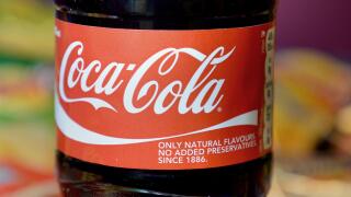 Undated file photo of a bottle of Coca Cola. The Coca-Cola bottling business for the UK and Europe has almost doubled its profits for the past year after it was boosted by the reopening of hospitality and acquisitions. Coca-Cola Europacific Partners (CCEP