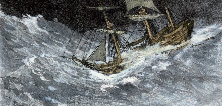 Sailing-ship struggling through stormy seas. Hand-colored woodcut