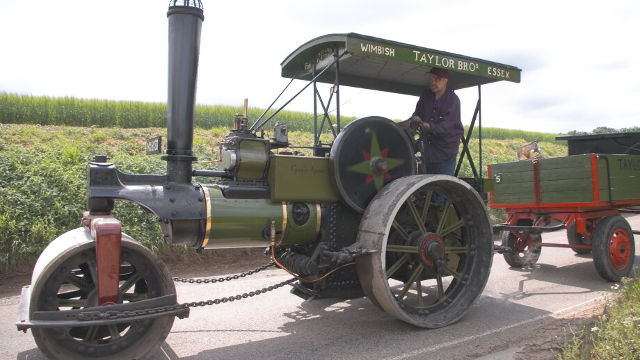 A steam roller rumbles through rural Essex