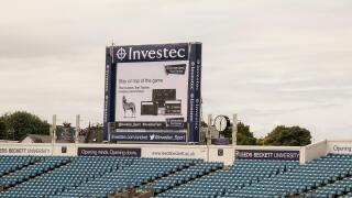 The Electronic video replay board at Headingley Cricket Ground, Leeds, showing advertising images and Investec - the sponsors.