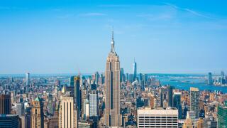 New York Manhattan, classic view in summer of the Midtown Manhattan skyline with the Empire State building sited at centre, New York City, USA