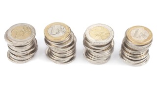 Four rolls of Euro Coins