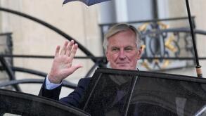 French Prime Minister Michel Barnier boards a car after the first weekly cabinet meeting at the Elysee Palace Monday, Sept. 23, 2024 in Paris. (AP Photo/Christophe Ena)