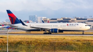 Delta Air Lines aeroplane aircraft airport from Adobe 18Sep20 575x375