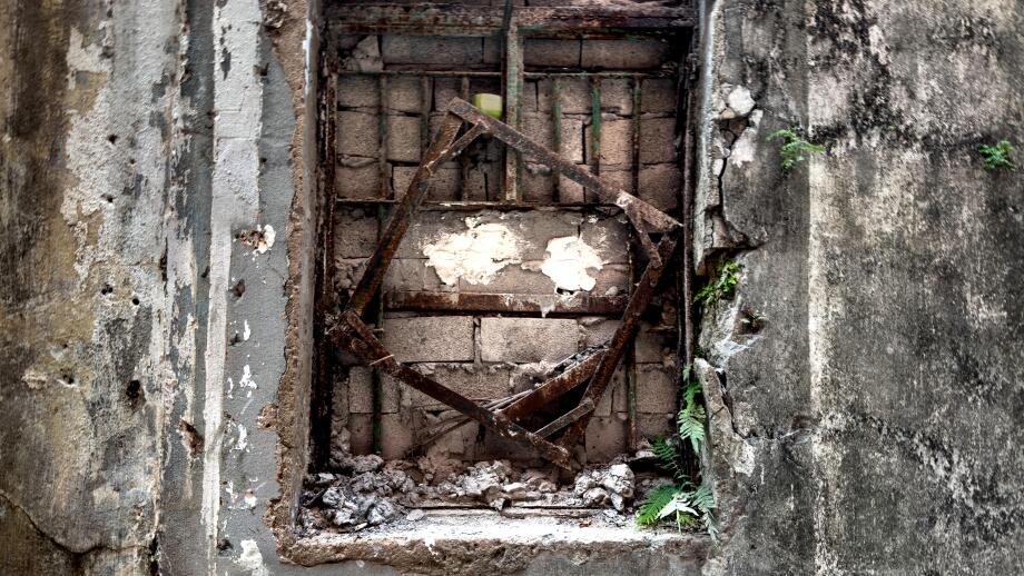 Crumbling infrastructure in old concrete building