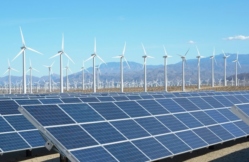 Photovoltaic solar panels and wind turbines, San Gorgonio Pass Wind Farm, Palm Springs, California, USA