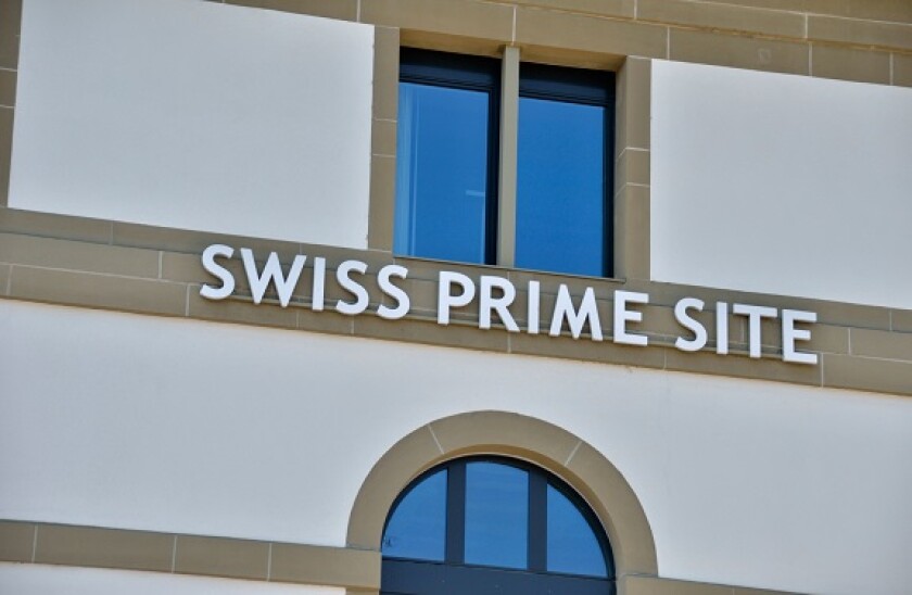 'Swiss Prime Site' sign on the side of a building in Olten, Solothurn, Switzerland.