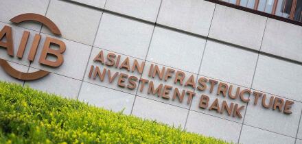 The logo of Asian Infrastructure Investment Bank (AIIB) is seen in Beijing, China on June 26, 2025. Asian Infrastructure Investment Bank is multilateral development bank and international financial institution that aims to collectively improve economic an
