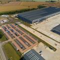 Aerial view of the Tritax Symmetry development at Symmetry Park, Biggleswade for the new portal framed regional distribution centre of the Co-op food group.
This steel-framed building covers 661,000 sq ft, 357 metres long, 144 metres wide, there are is al