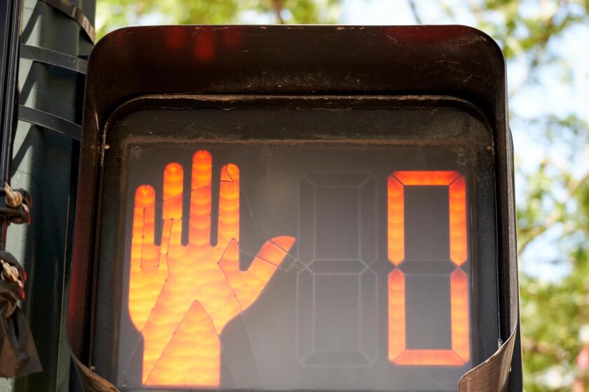 red hand stop sign with zero countdown timer pedestrian crossing crosswalk people signs chicago illinois united states of america