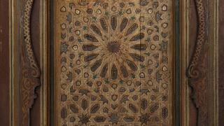 Islamic art.Typical wooden Moroccan door in a religious building.Marrakesh,Morocco,Africa