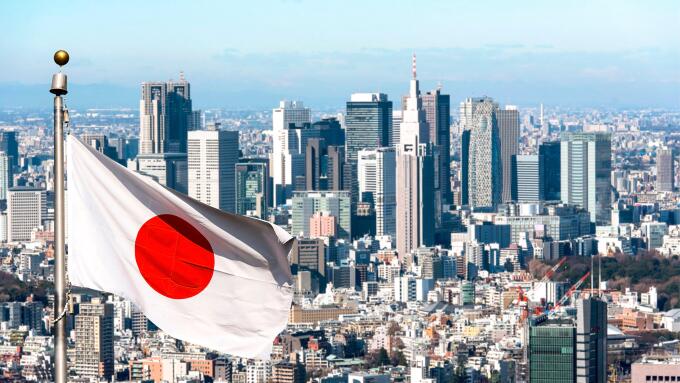 Panoramic view of Tokyo and Japanese flag, Japan