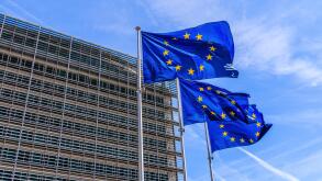 Brussels, Belgium - August 11, 2018: Flags of the European Union in front of the Berlaymont building in Brussels.