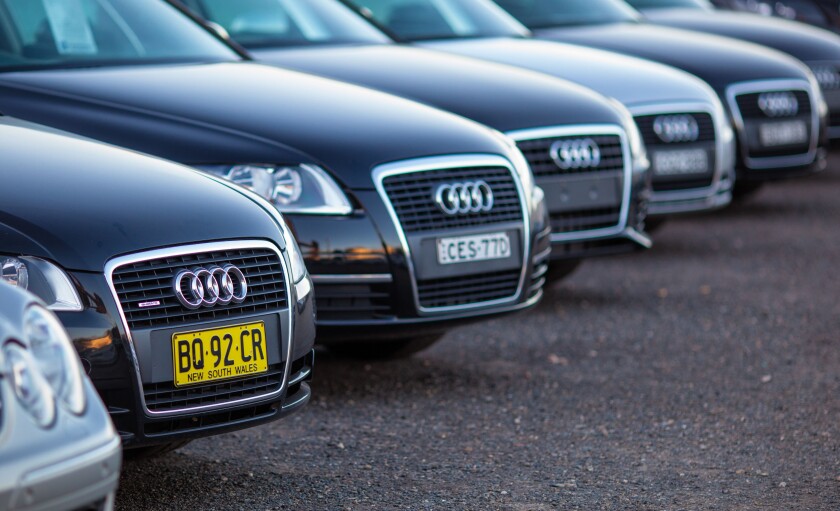 A Lineup of Luxury German Cars in a Used Car Yard