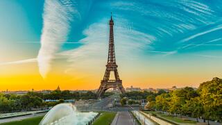 Eiffel Tower seen at sunrise from Esplanade du Trocadero in Paris.